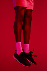 Poster - The shoes determine the outcome. Re filtered shot of an unrecognizable man wearing his workout sneakers.