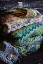 Pile Of Hand Knitted Clothes 
