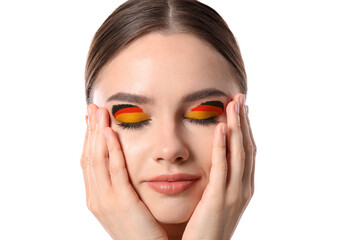 Poster - Young woman with creative makeup in colors of German flag on white background