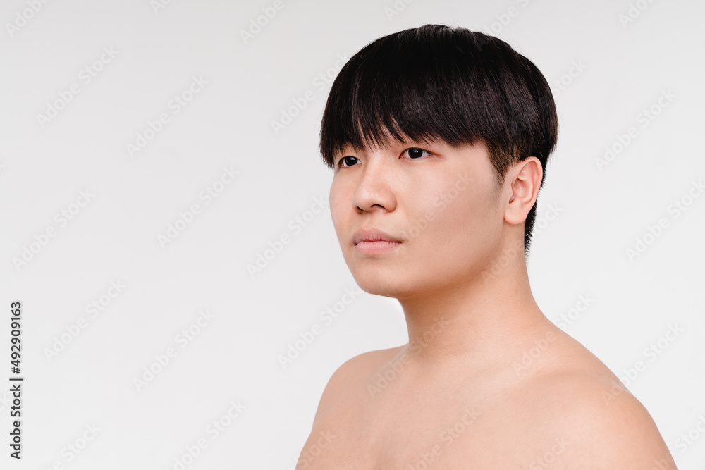 Side view portrait of young asian korean shirtless naked man with clear