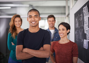 Poster - Their combined minds create a great team. Cropped portrait of a team of young creative professionals standing in the office.
