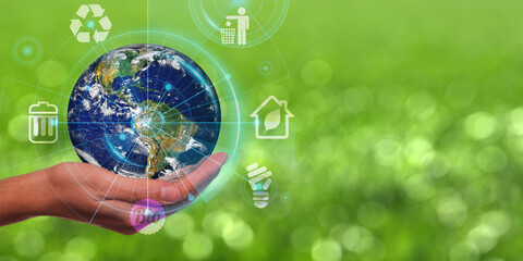 Poster - Earth Day is held in hands. Energy conservation, environmental preservation, and long-term development are all concepts that are being explored. Ecology concept