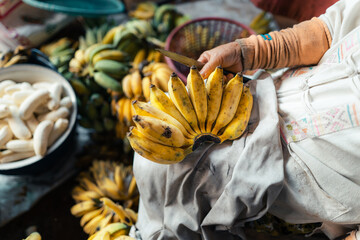 Poster - cultivated banana for processing ,Banana in the hand of the seller