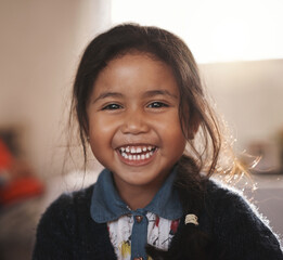 Shes a chipper child. Portrait of an adorable little girl at home.