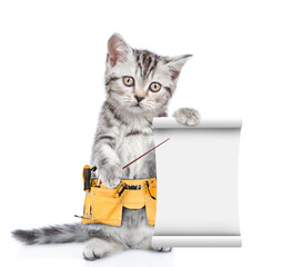 Poster - Funny cat wearing toolbelt points on empty list.  Isolated on white background
