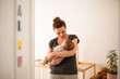© ReeldealHD images - New Mum cradling her baby and smiling in her nursery
