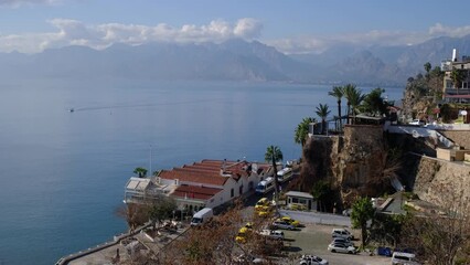 Wall Mural - walk through the old city in Antalya. winter season. view of the port in the old town from the observation deck near the Republic Square