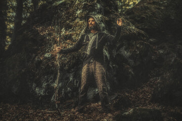 Fototapete - Shamanic man in ornamental dress in the nature.