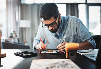 Poster - He has the technical knowledge to make this project a success. Cropped shot of a young engineer working from home.
