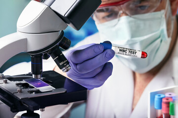 Wall Mural - doctor with Blood tube for WBC White Blood Count test in the hematology lab. Blood sample of patient for White Blood Count WBC test in microbiology laboratory