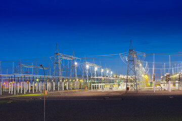 Wall Mural - View of an electric substation at night