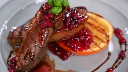 Wall Mural - Tasty duck breast with orange and berries