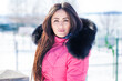 © Andrey_Arkusha - Young beautiful woman posing in winter park