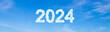 © SDF_QWE - Year 2024 word made of clouds on blue sky background