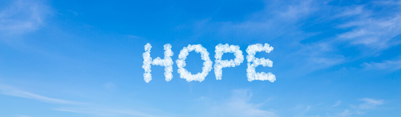 Wall Mural - Hope word made of clouds on blue sky background