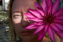 Portrait Of A Girl With A Flower On Half Of Her Face