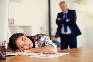 Aufkleber - Shes been caught sleeping on the job. Cropped shot of a businesswoman sleeping at her desk with her boss standing in the background.