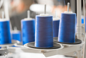 Aufkleber - Blue reels of threads industry background, Spools of colored cotton thread, ordered composition