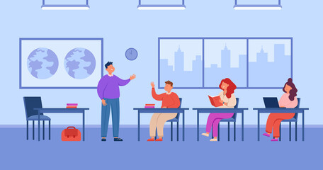 Wall Mural - Classroom with happy teacher and school or college students. Young boys and girls studying during lesson or class flat vector illustration. Education, teamwork concept for banner or landing web page