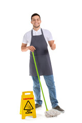 Wall Mural - Young male worker of cleaning service with mop and caution sign showing thumb-up on white background