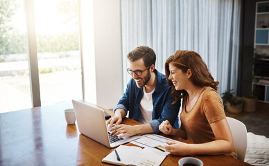 were always looking for the best deals online. shot of a young couple doing some online shopping on 