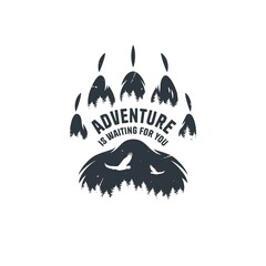 camping footprint with bear paw or grizzly step and forest for wild life