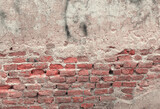 Fototapeta  - red brick block wall texture old background ancient weathered brick wall with cracks and destroyed stucco layer with copy space