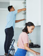 © Siphosethu F/peopleimages.com - Saturday is a cleaning day. Shot of a young couple cleaning their kitchen together.