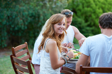 Canvas Print - Ready to enjoy my lunch. Happy young teen at a lunch with a group of friends - portrait.