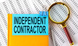 © Iryna - INDEPENDENT CONTRACTOR text on sticker on notebook with magnifier and chart. Business concept