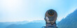 Binoculars telescope in the mountains alps in the Kleinwalsertal in Austria with a great view