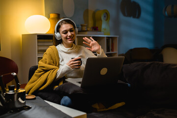 Wall Mural - woman having video chat from home