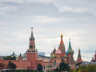 Wall Mural - Beautiful view of Red Square with Moscow Kremlin and St. Basil's Cathedral in rainy summer. This is main tourist destination in Moscow. Beautiful panorama of heart of city.