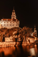 Wall Mural - Nigth view of Cesky Krumlov,Czech Republic.Famous Czech medieval town with Renaissance and Baroque castle on steep rock above Vltava river.UNESCO heritage site.Urban monument reservation.Evening city