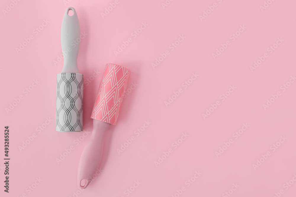 New lint rollers on pink background