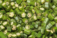 Close Up Shot Of Several Cut Okra Pieces Top Down View.