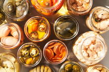 Opened Jars With Pickled Vegetables
