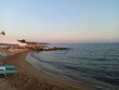 Summer seascape, Nikiti village of Halkidiki. Sea and sunset by the beach. 