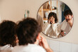 © BONNINSTUDIO/Stocksy - Couple doing daily beauty procedures in bathroom