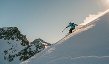 Backcontry Skier At Sunny Day