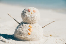Happy Snowman Built With Beach Sand 