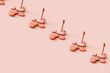 © Giada Canu/Stocksy - a row of pink hearts with cupid's arrow.