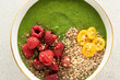 © Pixel Stories/Stocksy - Strawberry, pineapple, spinach detox breakfast smoothie bowls
