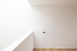 © Koen Van Damme/Stocksy - door in hallway