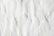 © Yaroslav Danylchenko/Stocksy - Seamless pattern of white delicate feathers
