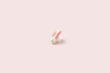 White Rabbit Toy On Pastel Pink Background