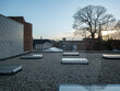© Koen Van Damme/Stocksy - skylights on roof