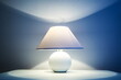 geometric night light. white night lamp in the form of a ball and a cone on a gray background