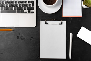 Wall Mural - Clipboard mock up on home office workspace with coffee cup and stationery