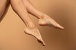 © vladimirfloyd - Close up of a female wet legs and feet with water gliding over them